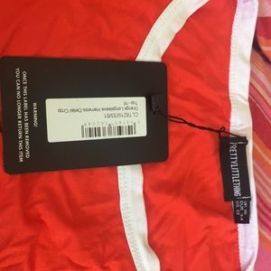 Pretty little thing orange long sleeve Harness